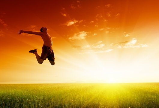 Man jumping background sunraising