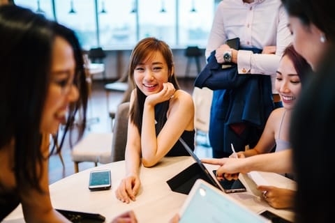 Group of people at office around table and tal