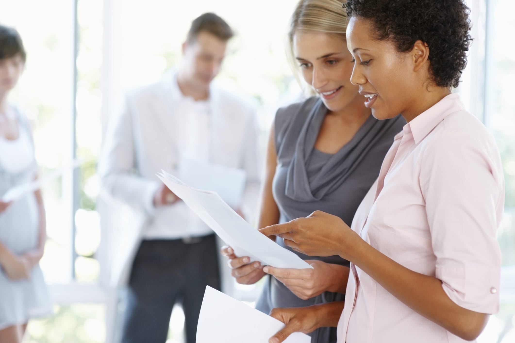 Businesswomen with documents