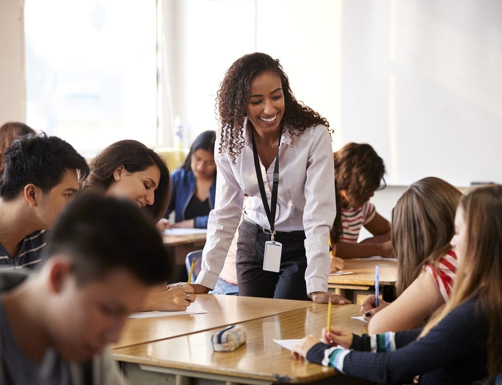 Image of Teacher Working with Students