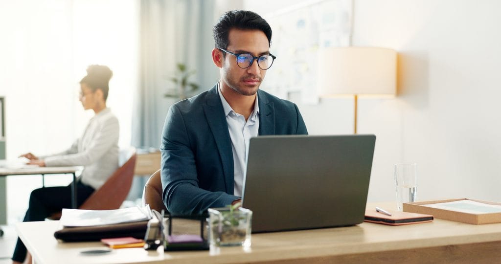 Business man working at laptop
